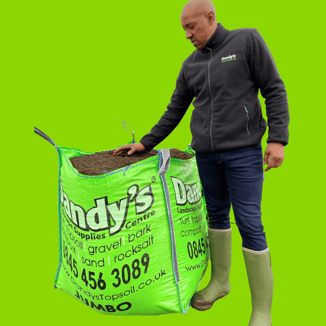 Dion Dublin with a Bulk Bag of Dandy's Compost