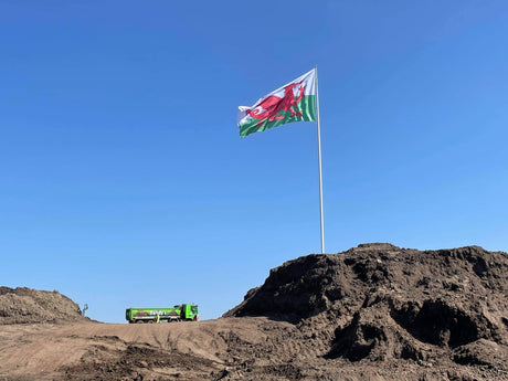 Largest Welsh Flag in UK raised by Jack Sargeant MS at Dandys Topsoil