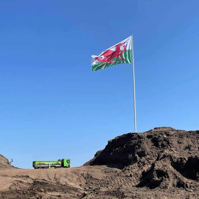 Largest Welsh Flag in UK raised by Jack Sargeant MS at Dandys Topsoil