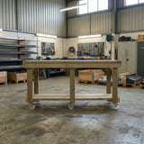 Indoor/outdoor workbench, pressure treated bench with wheels - Dandys Landscape Supplies